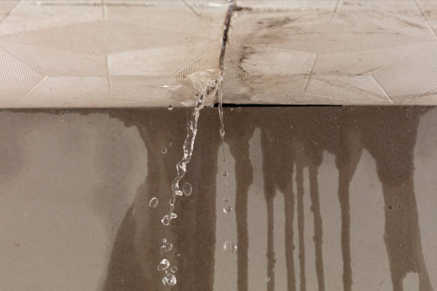 Professional Flood Damage Cleanup technician working in Pike, NH